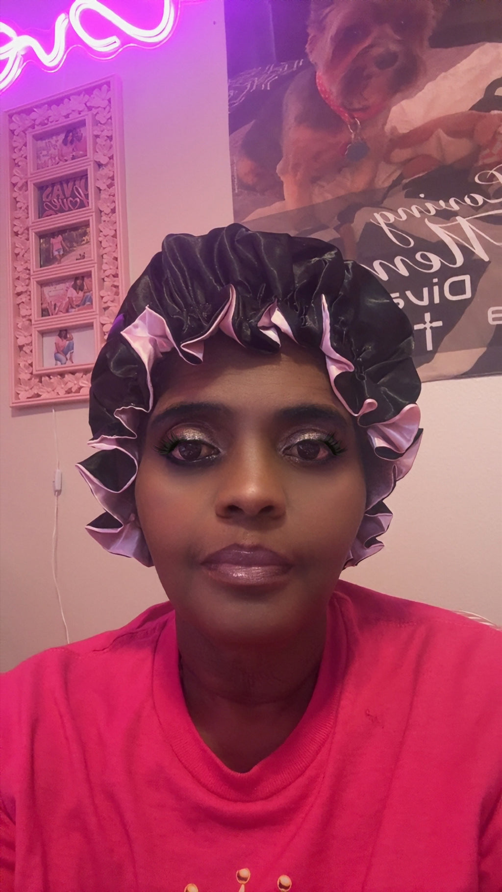 Model wearing black side of reversible satin bonnet