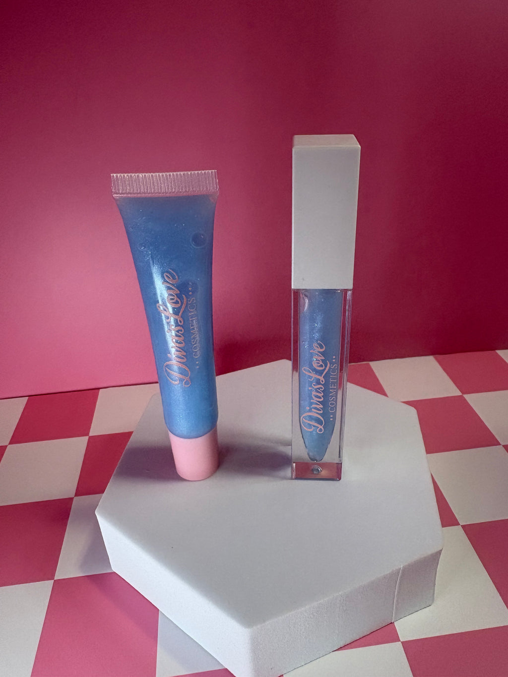 Sky Diva Bundle - blue shimmer lip gloss squeeze tube and quad tube on pink checkered background