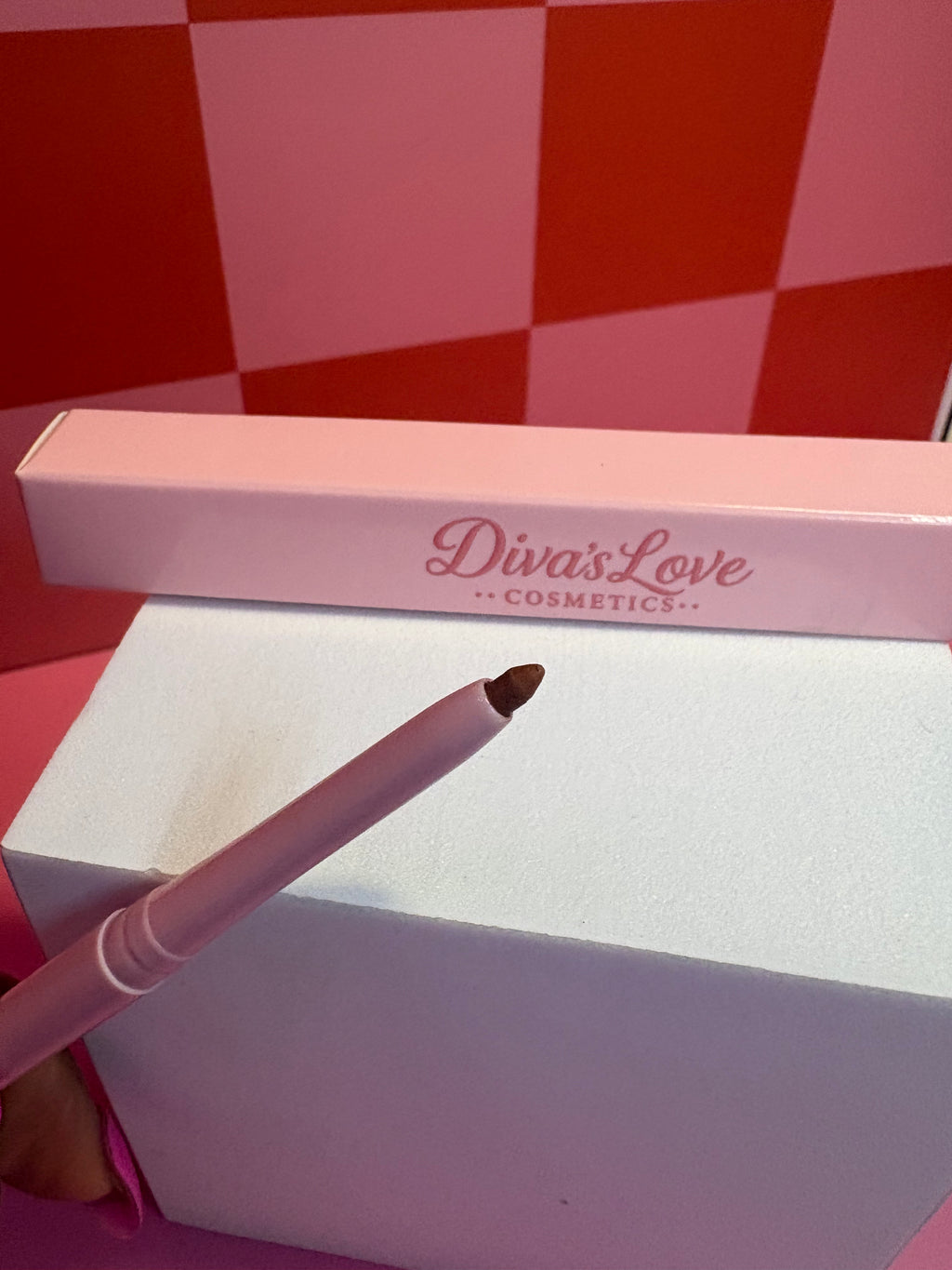 Diva's Love Cosmetics brown lip liner close up with pink packaging