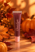 Diva’s Plum squeeze tube with fall background